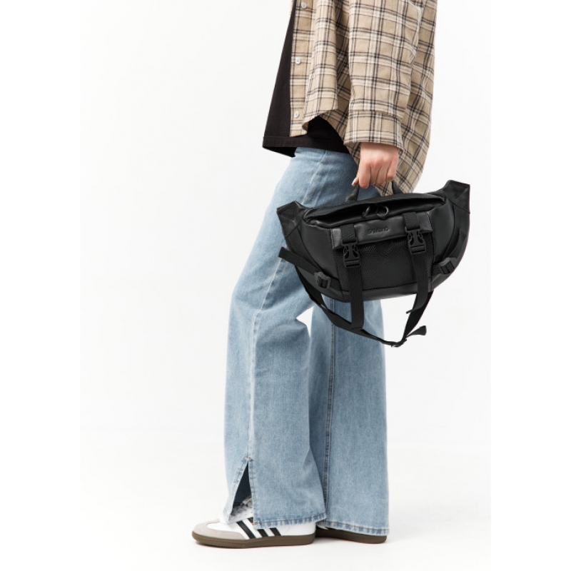 Велика шкіряна жіноча поясна сумка бананка Sambag DynamicDart чорна (80411101)